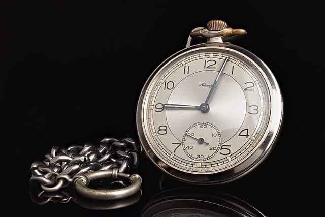 pocket watch worn on the left hand